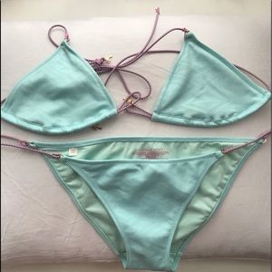 Blue VS string bikini with palm tree accents